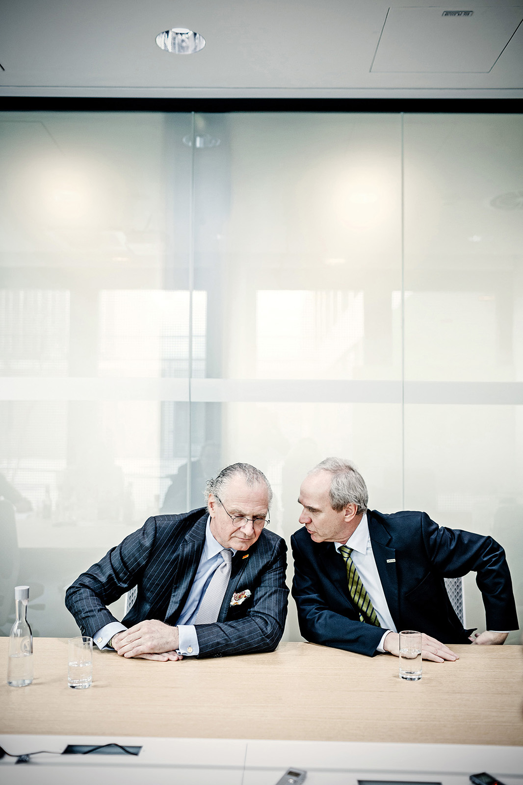 Portrait von dem ehemaligen CEO Karl-Ludwig Kley und seinem Nachfolger Stefan Oschmann bei Merck